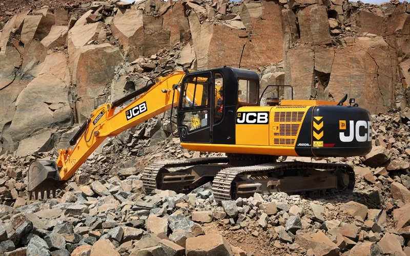 Excavator working in a rocky quarry