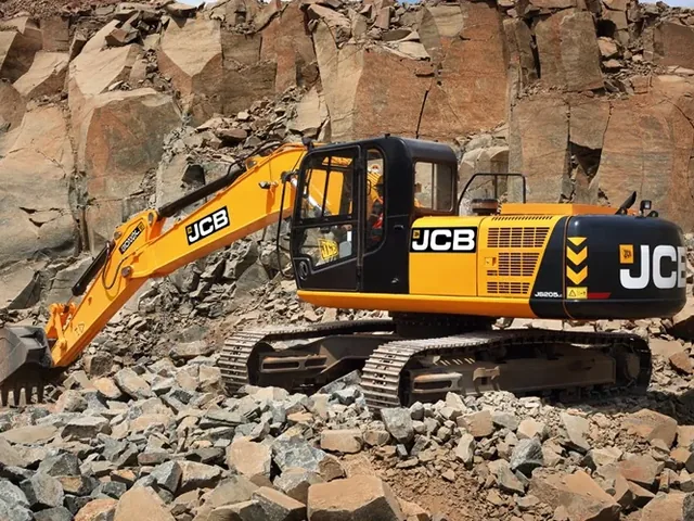 Excavator working in a rocky quarry